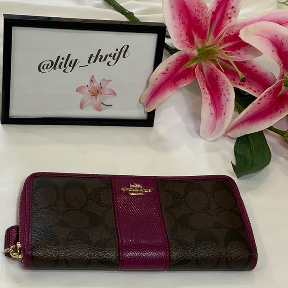 Coach Handbags - Coach Signature Stripe Zip Around Wallet